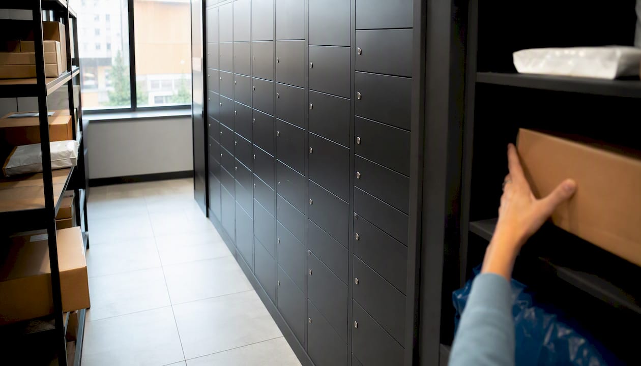 Organized package room with lockers and parcels