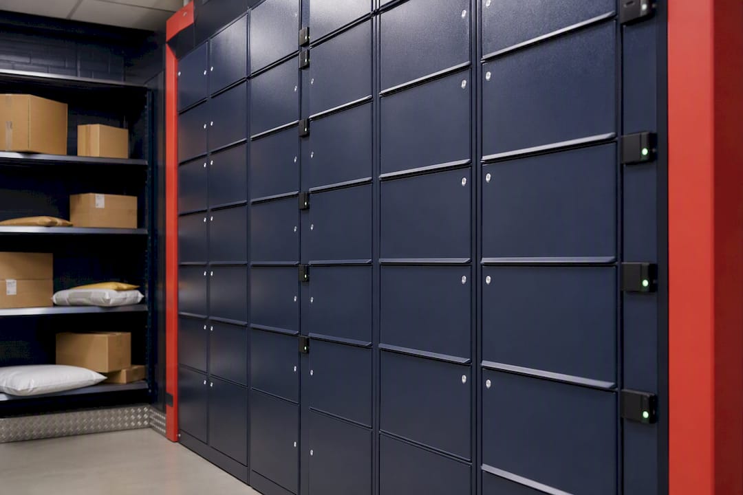 Organized refrigerated package room with lockers and parcels