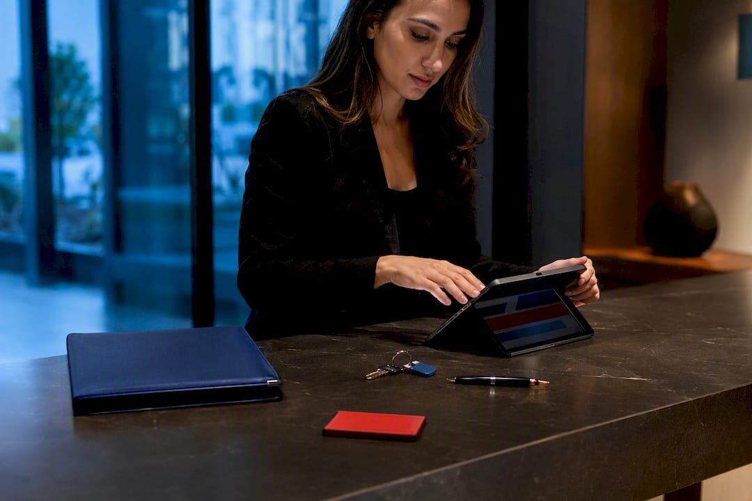 Leasing coordinator reviewing resident onboarding materials