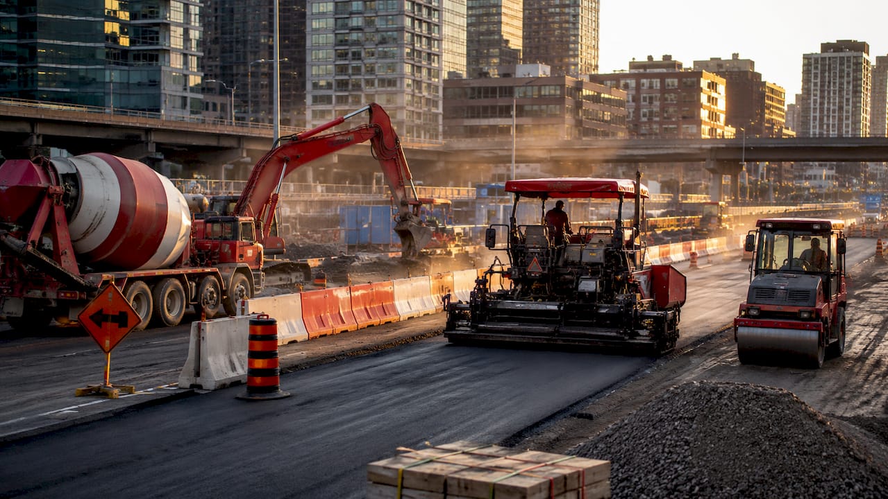 Road construction crew working on urban street