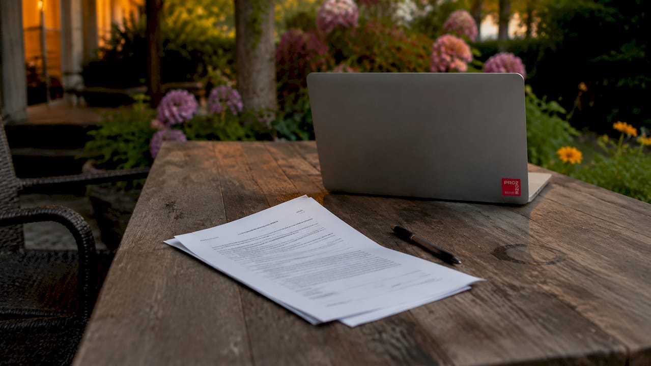 Contract papers and pen on office desk