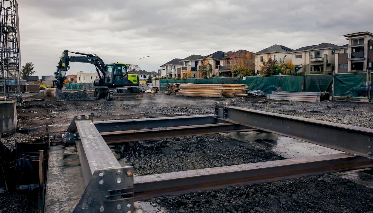Urban construction site with equipment and erosion controls