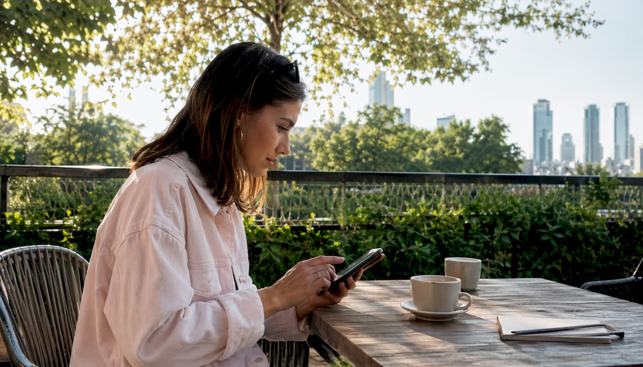 Hands holding smartphone ready for scanning
