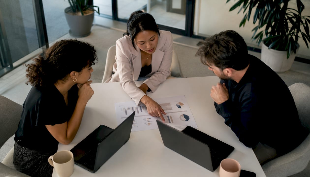 Team discussing encrypted scanning in meeting room