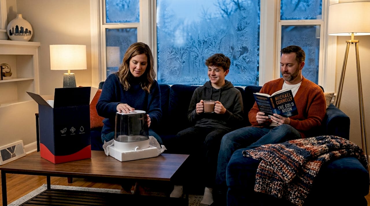 Family setting up humidifier in winter