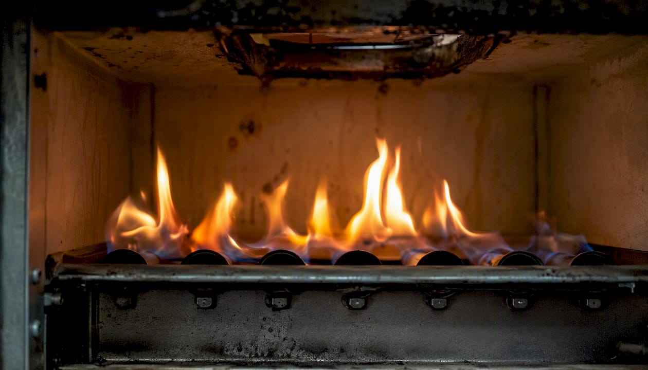 Flickering yellow gas burner flame