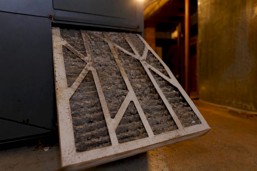 Close-up of dirty furnace air filter