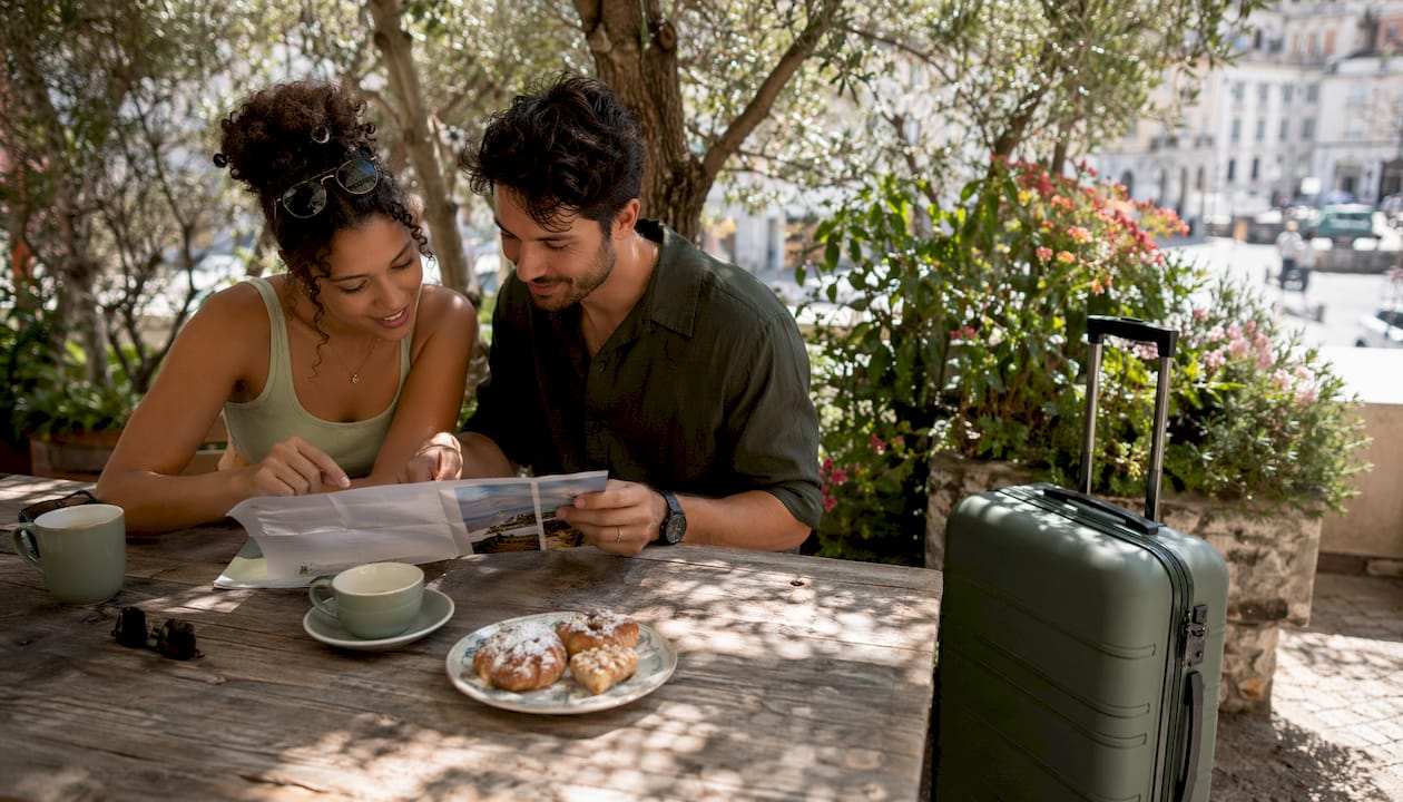 Couple discussing private versus public transport options