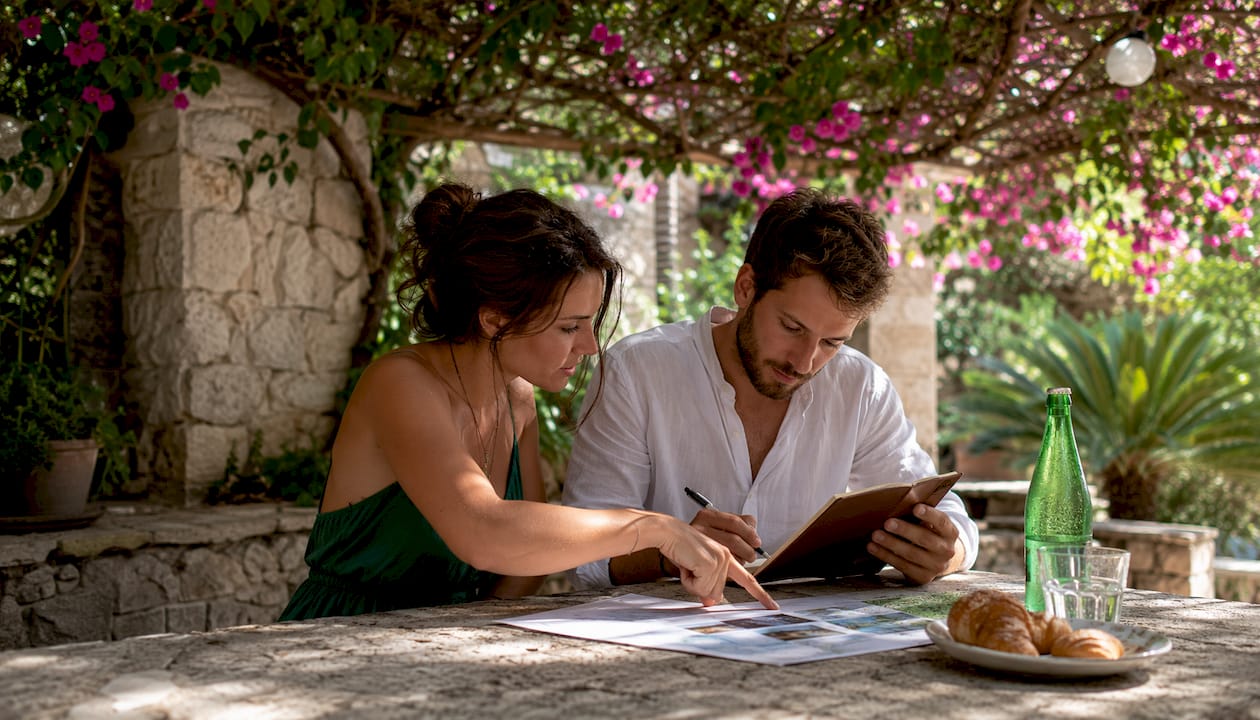 Tourists planning private tour itinerary outdoors