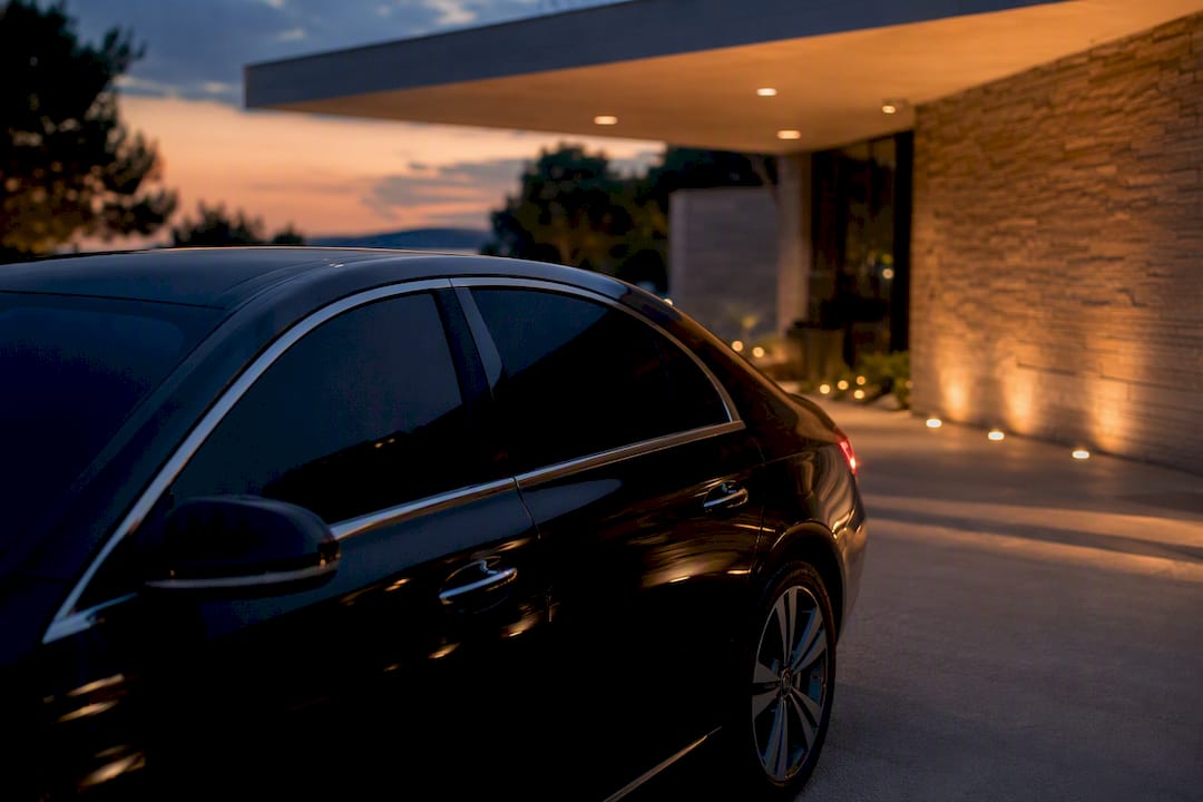 Unmarked vehicle parked at private hotel side entrance