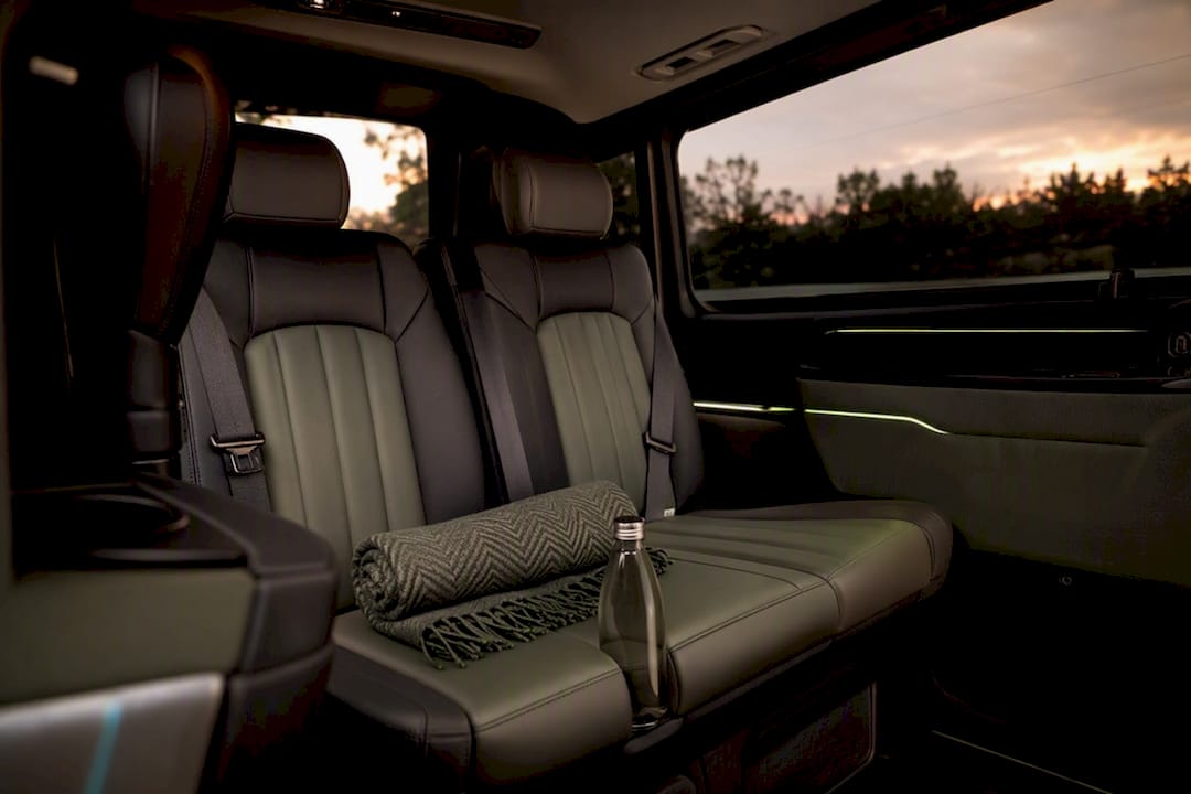 Private luxury vehicle interior with comfort amenities