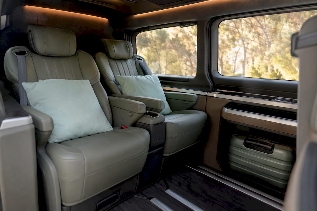 Luxury transfer vehicle interior seating and luggage space