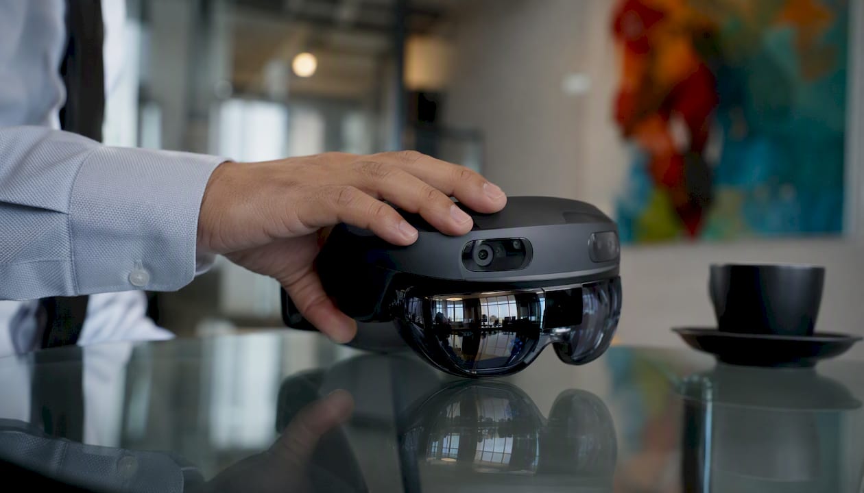 Close-up of AR headset on desk in tech office