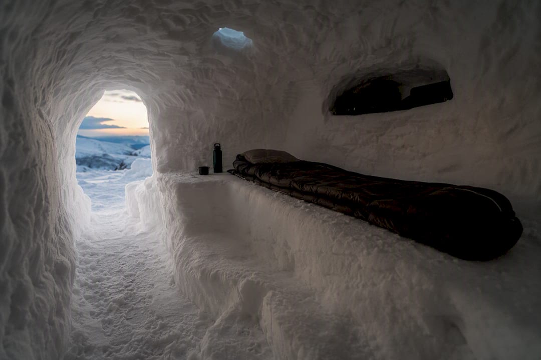 Raised sleeping bench inside snow cave