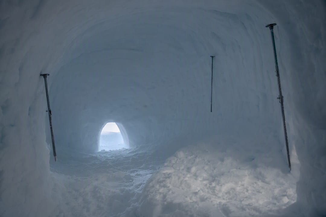 Inside rounded dome of snow cave chamber