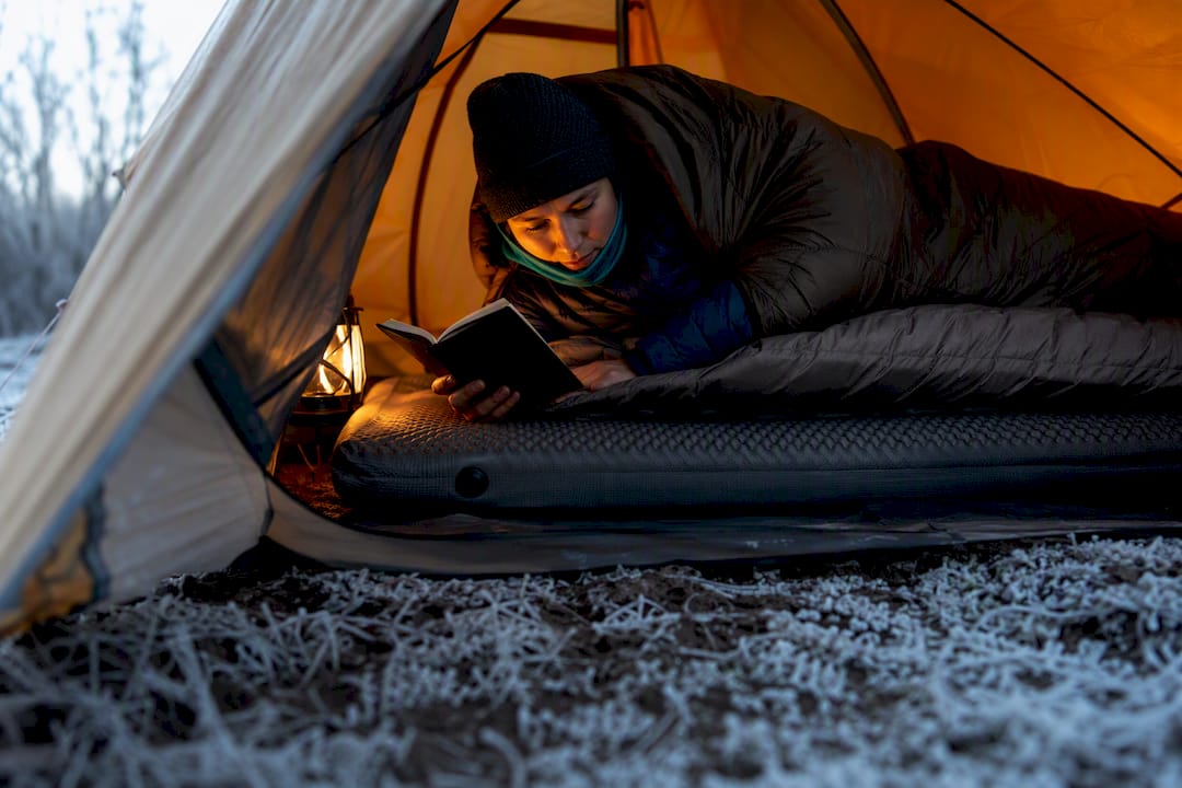 Sleeping pad insulating camper from frozen ground