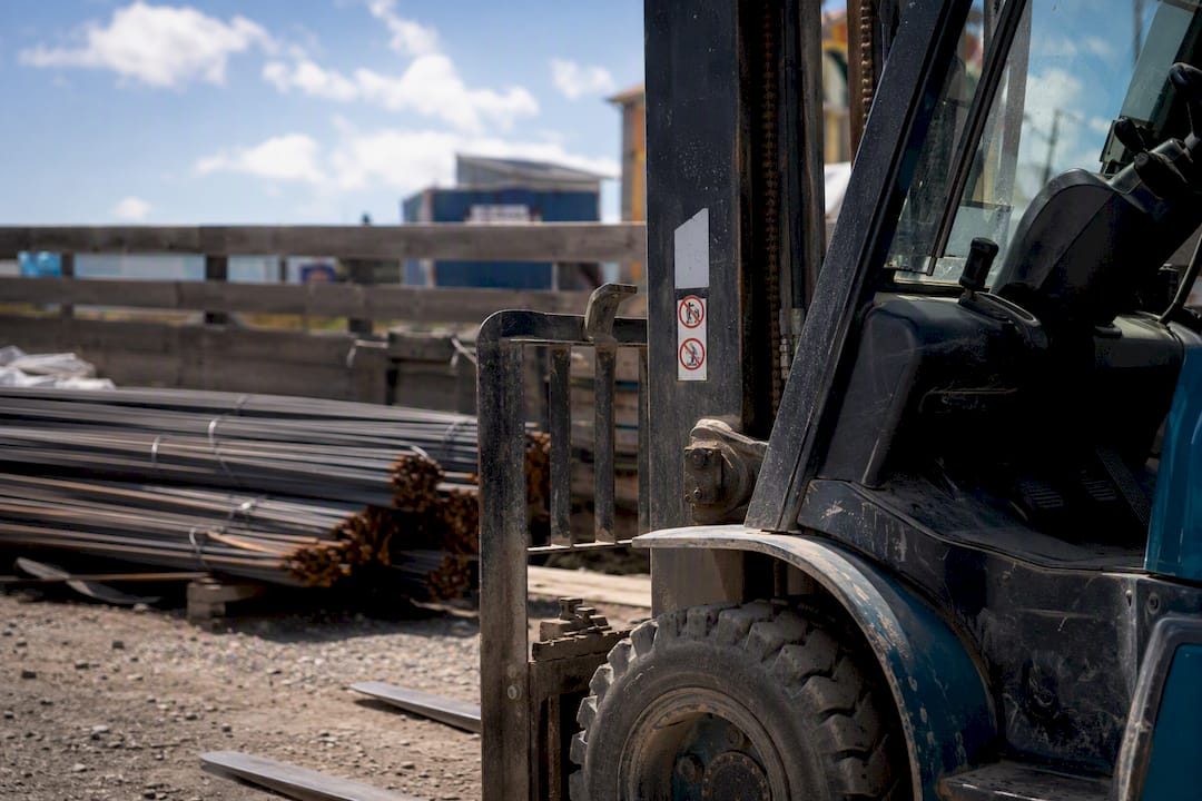 Forklift’s lifting mechanism in warehouse