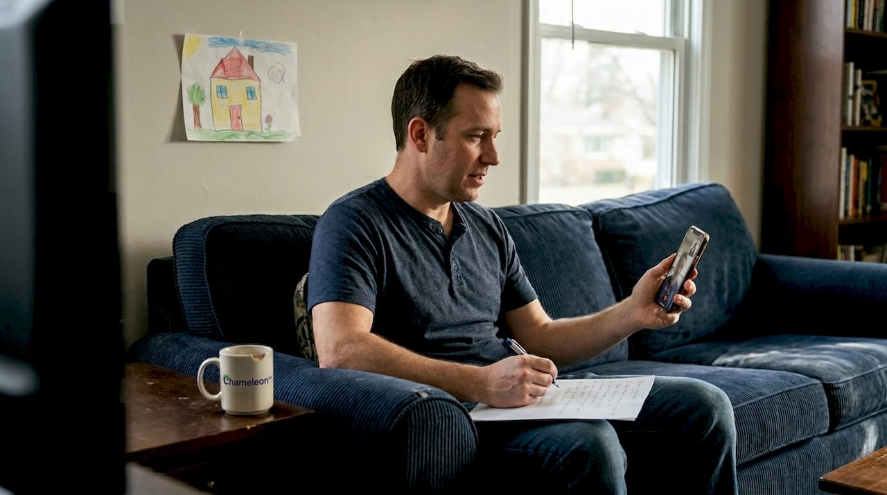 Father prepares questions for virtual doctor visit