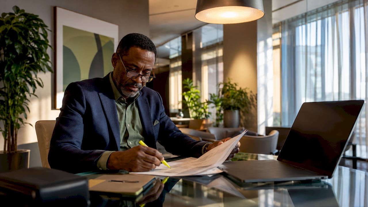 Doctor reviewing patient charts in office