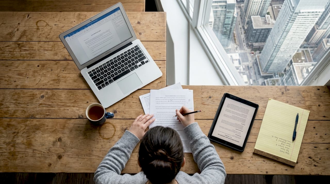 Woman reviewing draft affidavit Ontario condo