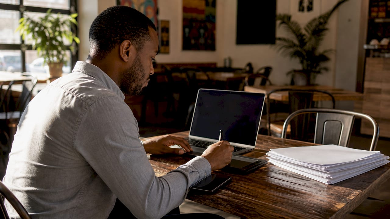 Man preparing documents for remote online notarization