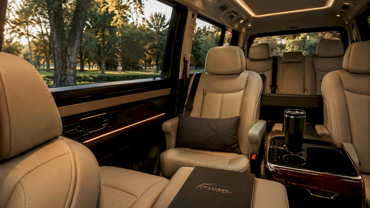 Interior of upscale black Ascend in Motion airport transfer van