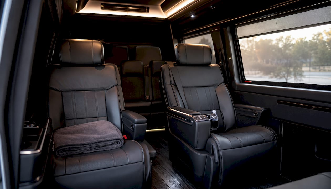 Luxury interior of black Ascend in Motion Mercedes-Benz Sprinter minivan