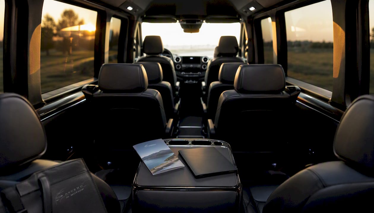 Interior of Ascend in Motion branded black minivan