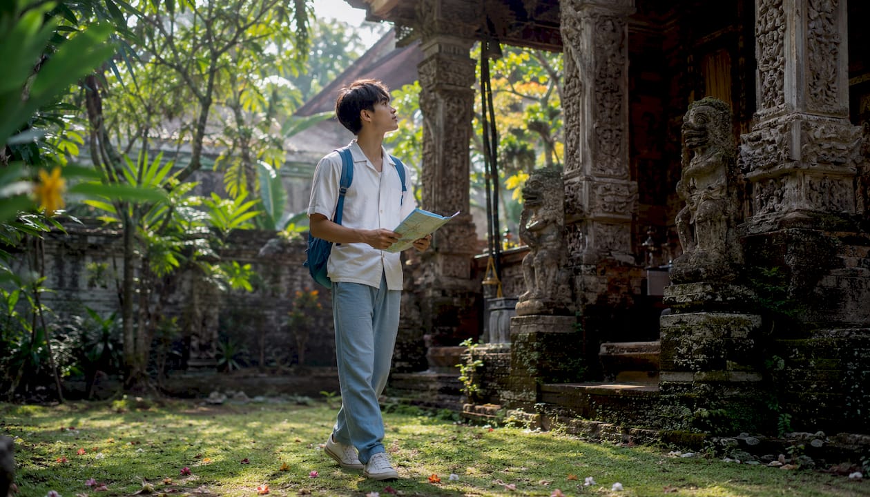 Traveler exploring a sacred spiritual site