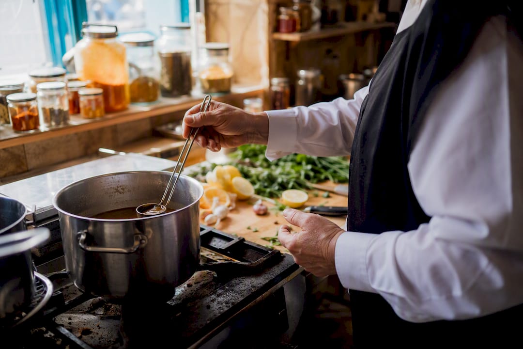 Mashgiach hands supervising kosher cooking