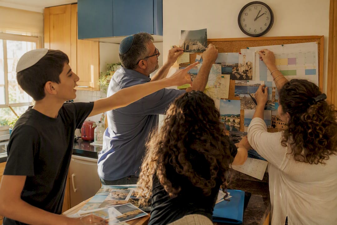 Family planning Bar Mitzvah schedule at home table