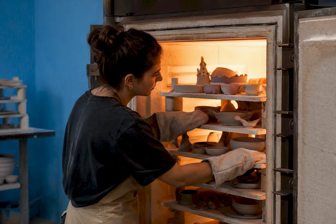 Ceramic pieces inside an open kiln