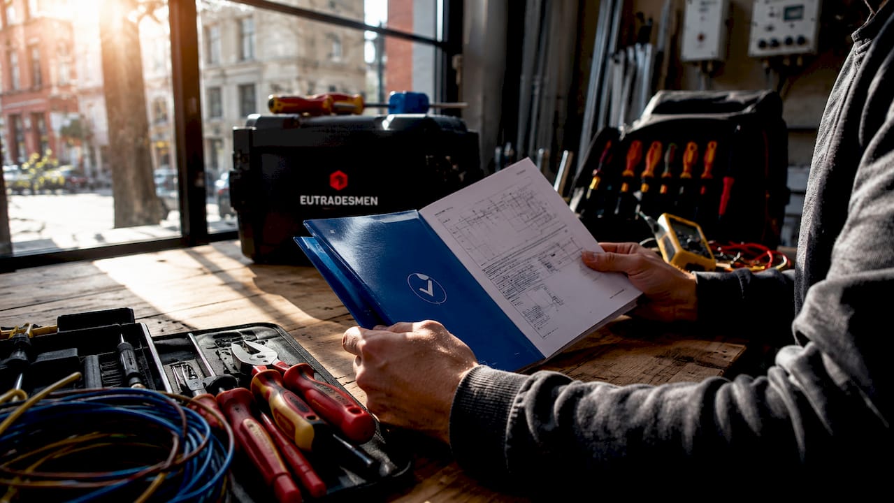 Light installation compliance materials on table