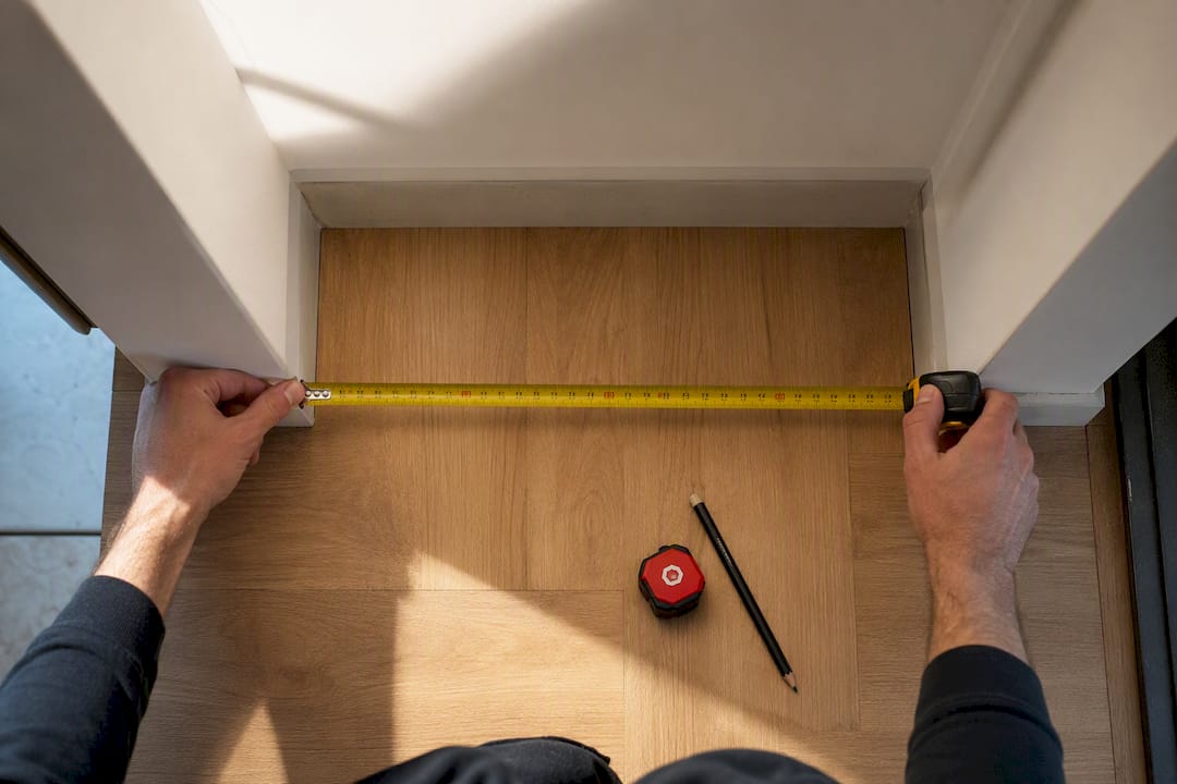 Tape measure across apartment alcove