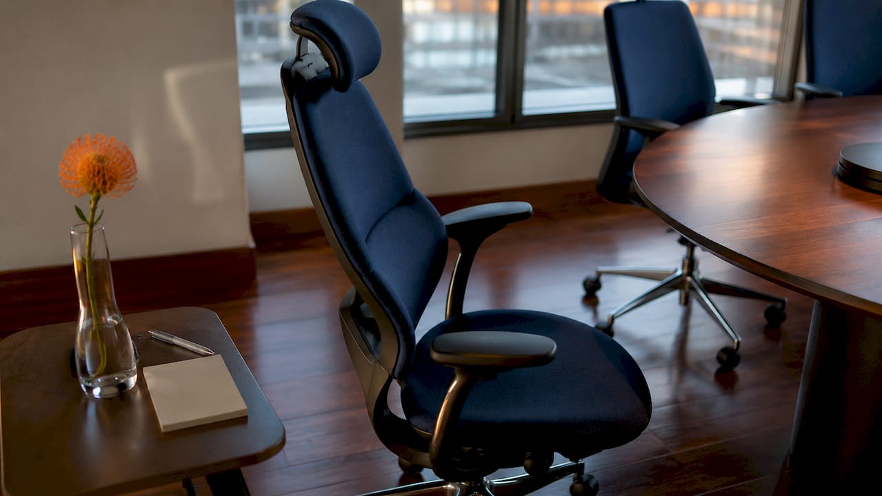 Ergonomic executive chair in modern boardroom
