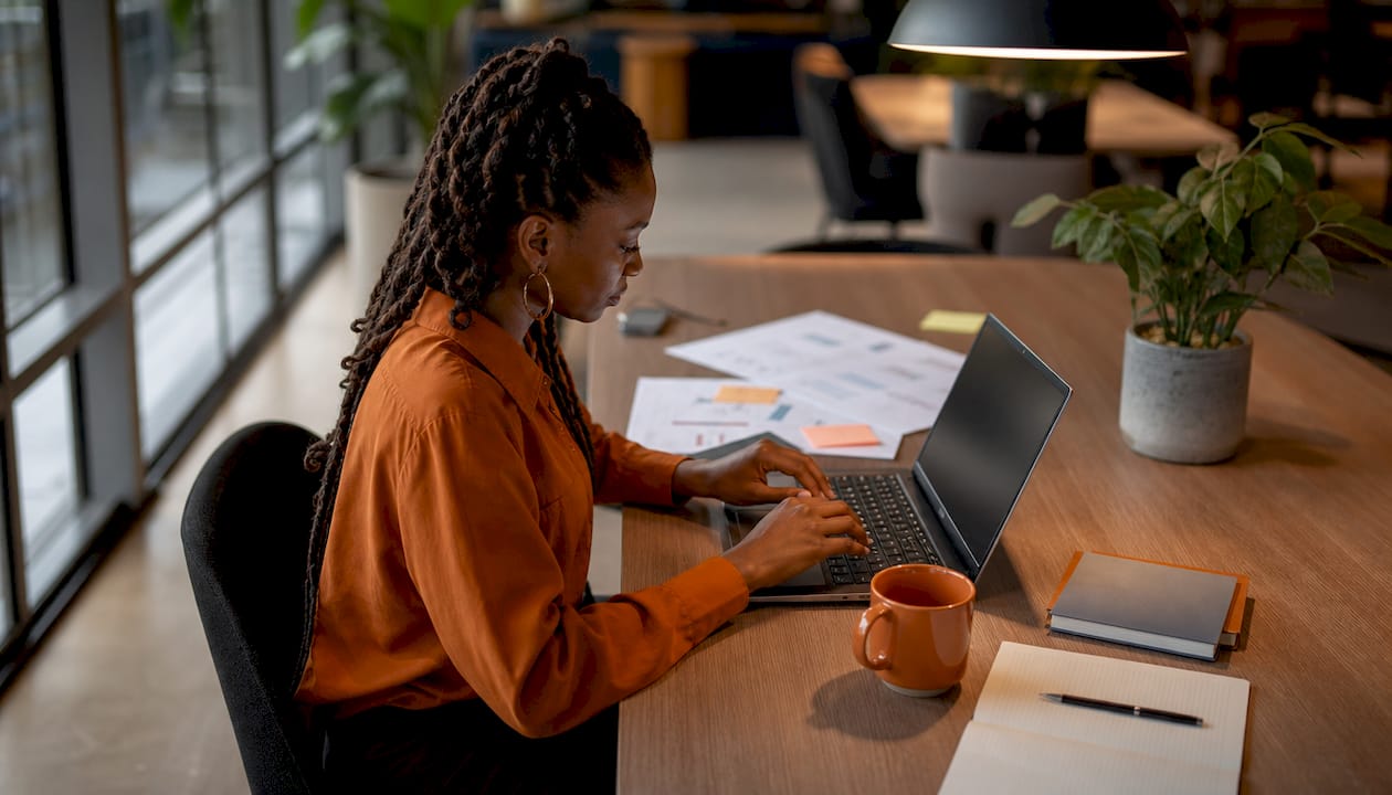 Woman working quietly at individual desk