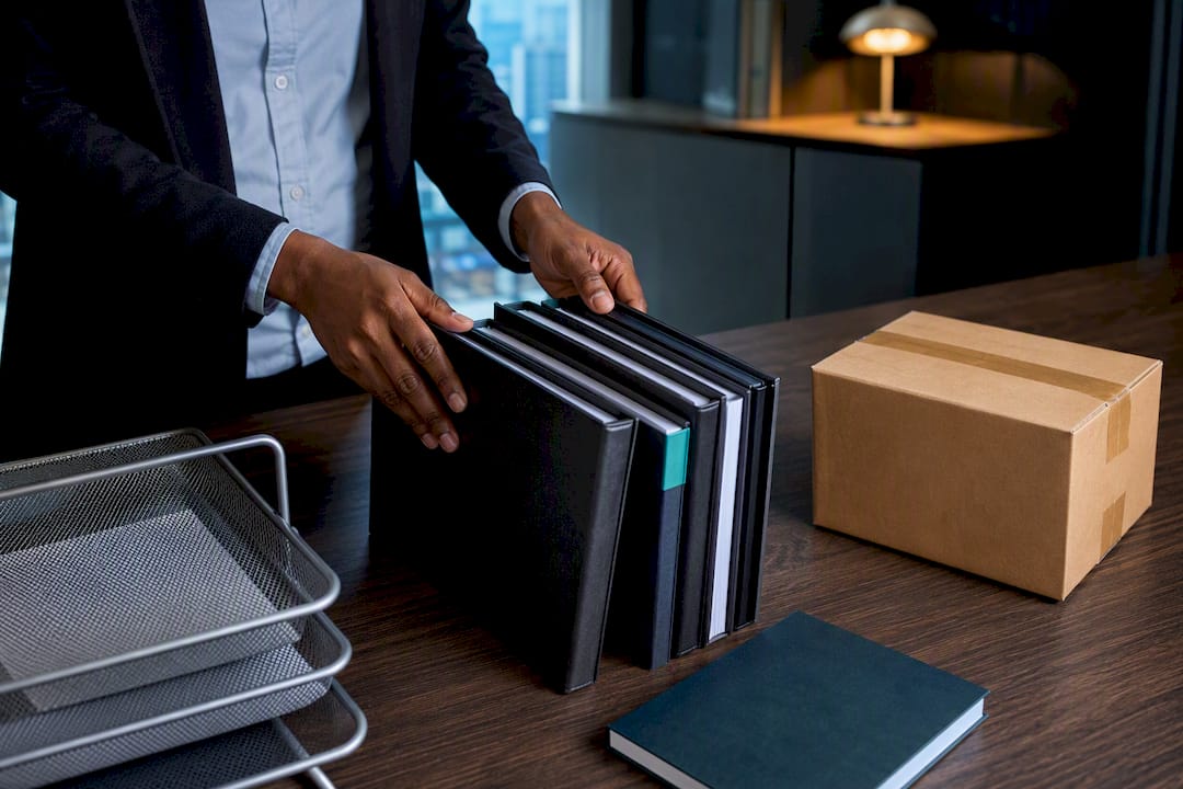 Customs permit folders beside an import shipment