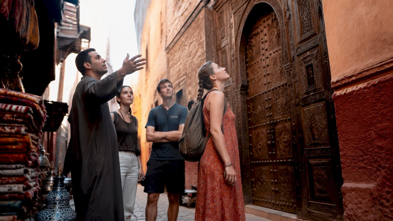 Students exploring historic Marrakech Medina alleys