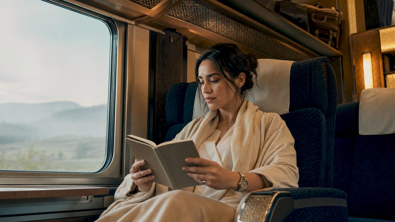 Morocco Train Guide: Routes, Tickets, and Tips 1 Passenger relaxing inside Al Boraq train first class