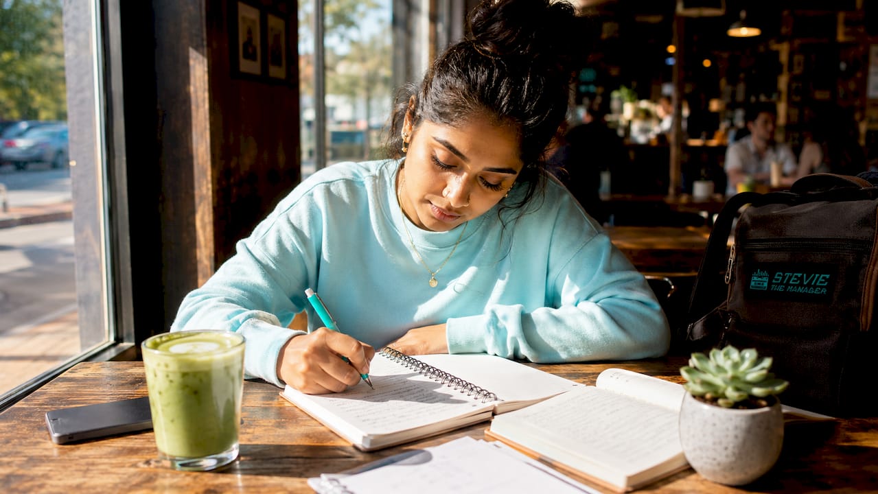 Woman brainstorming motivational Drake lyrics