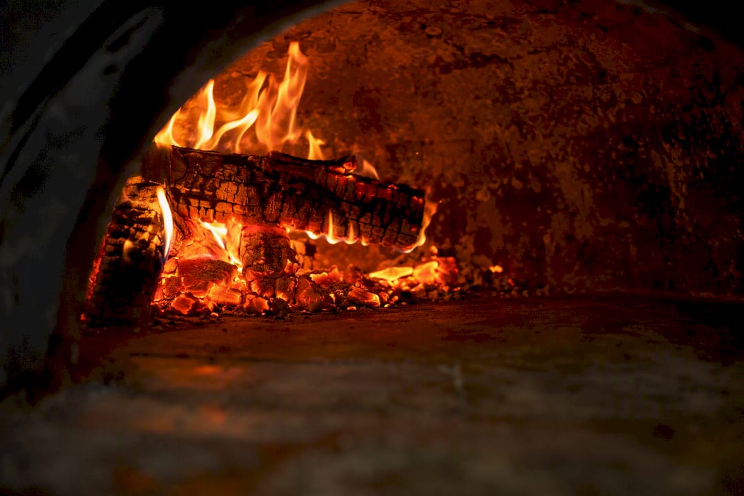 How much wood does a pizza oven really use?
