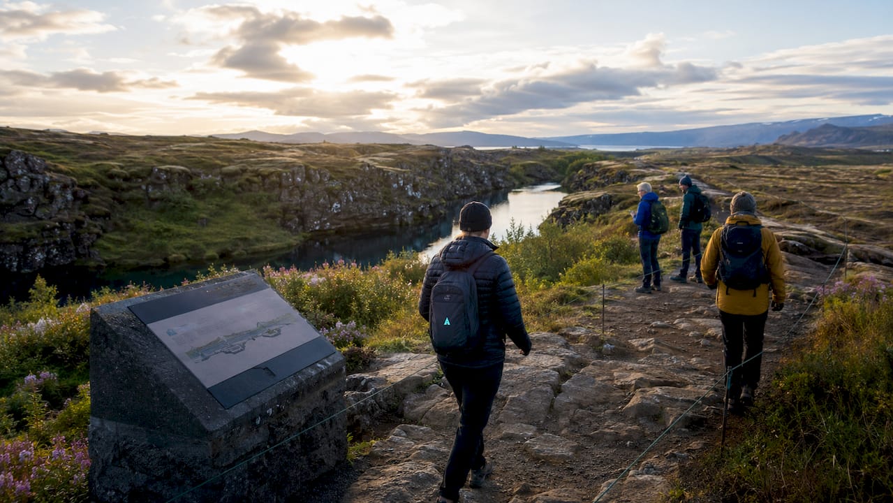 Tourists hiking Þingvellir National Park trail