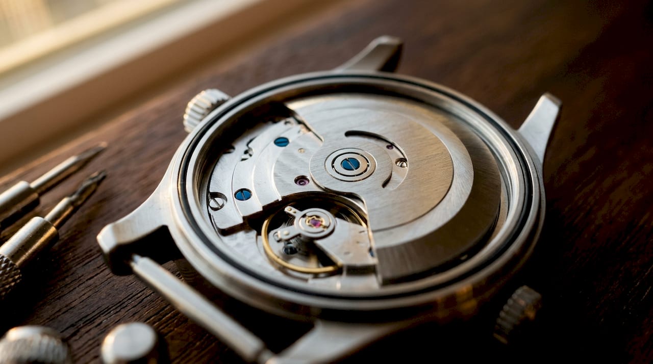 Close-up of automatic watch rotor inside caseback