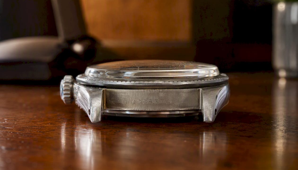 Close-up of Rolex serial number engraving on watch case