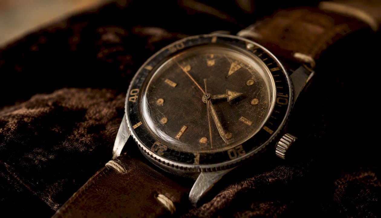 Vintage Omega watch dial with patina