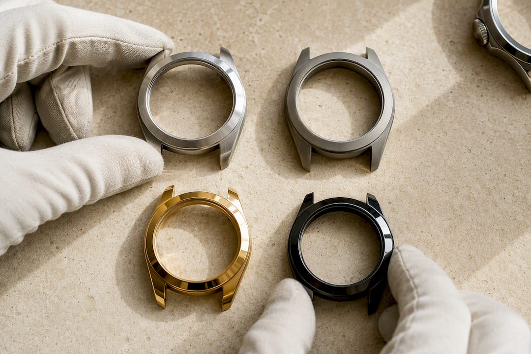 Watch case material samples arranged for comparison
