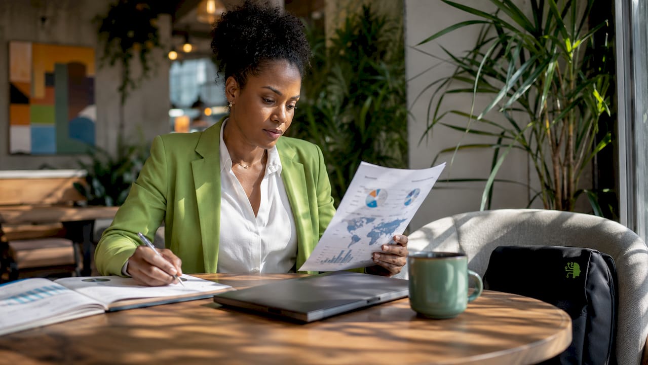 Business strategist reviewing market expansion analysis