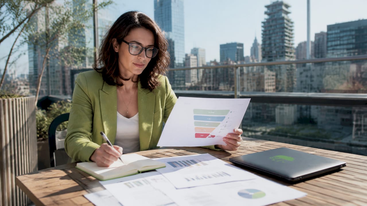 Marketing manager reviewing agency sales funnel diagram
