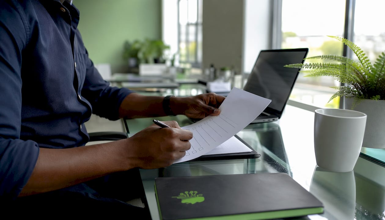 Procurement officer evaluating pitch documents