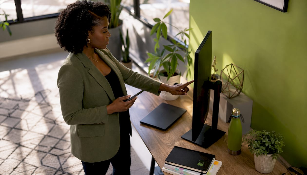 Businesswoman working on sales automation software
